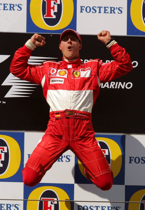 Michael Schumacher celebrates on the podium