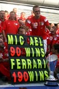 Michael Schumacher celebrates his win 90th win