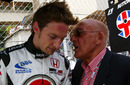 Sir Stirling Moss offers Jenson Button some advice
