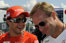 Felipe Massa and Rubens Barrichello share a joke at the Hungaroring