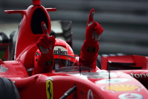Ferrari driver Michael Schumacher celebrates his victory at the 2006 Chinese Grand Prix.