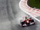 Felipe Massa splashes through the puddles during first practice