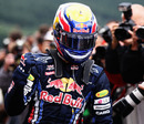 Mark Webber celebrates taking pole position at Spa