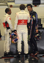 Mark Webber talks to Lewis Hamilton and Jenson Button after qualifying