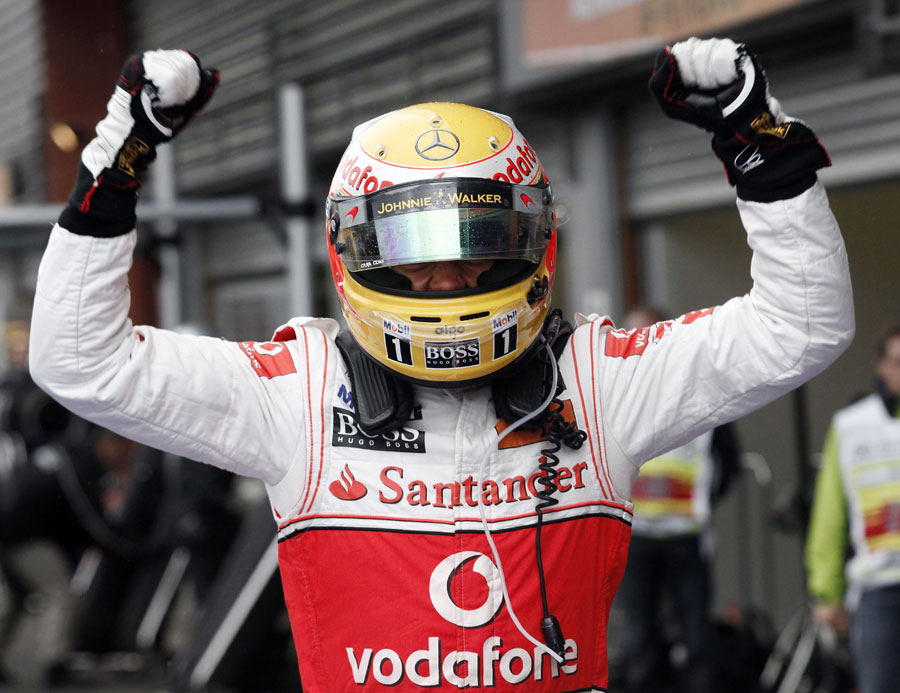 Lewis Hamilton celebrates winning the Belgian Grand Prix for the first time