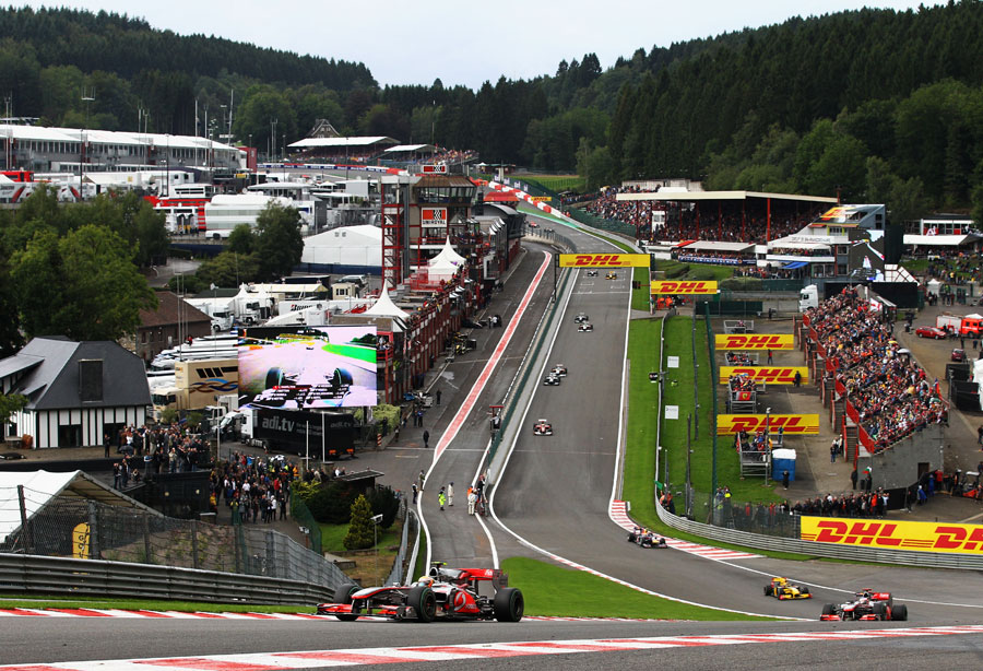 Lewis Hamilton leads the field through Eau Rouge at the start