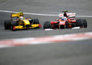 Fernando Alonso leads Vitaly Petrov