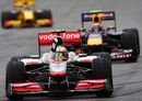 Lewis Hamilton celebrates beating Mark Webber and Robert Kubica in Spa