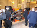 A McLaren MP4-23 is moved to the Waldorf Hilton Hotel  for the Formula 100 presentation