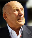 Sir Stirling Moss in the paddock