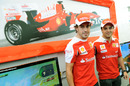 Fernando Alonso and Felipe Massa at a Ferrari F1 simulator at Monza