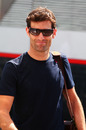 Mark Webber arrives at the circuit with a smile