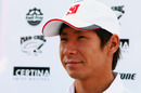 Kamui Kobayashi prepares for interviews in the paddock