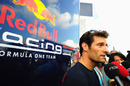 Mark Webber fields questions outside the Red Bull motorhome