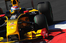 Vitaly Petrov rides the kerbs in his Renault