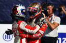 Sam Bird celebrates victory with team-mate Jules Bianchi after winning race 1