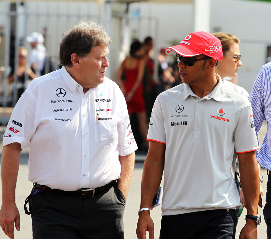 Lewis Hamilton with Mercedes sporting director Norbert Haug