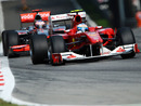 Fernando Alonso held off Jenson Button for victory 