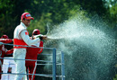 Jenson Button sprays the crowd with champagne 