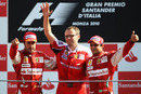 Fernando Alonso and Felipe Massa celebrate with Stefano Domenicali on the podium