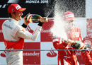 Jenson Button sprays Fernando Alonso with champagne