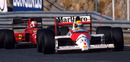 Nigel Mansell on the tail of Ayrton Senna