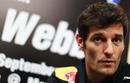 Mark Webber talks to journalists at a press conference