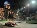 Fernando Alonso exits the chicane in front of city hall