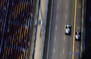 Adrian Sutil and Michael Schumacher go wheel-to-wheel