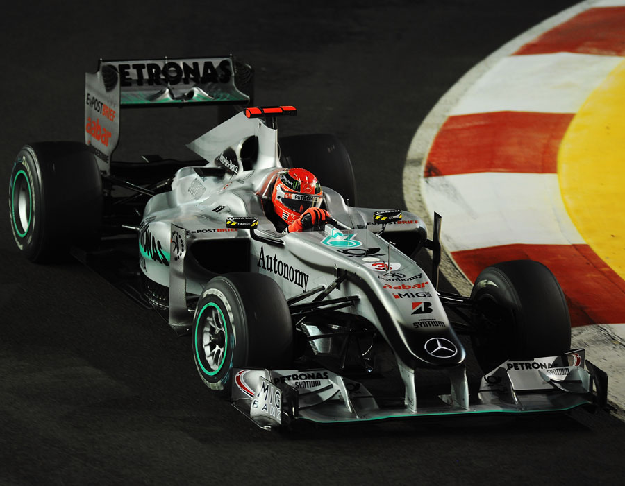 Michael Schumacher out on a damp track