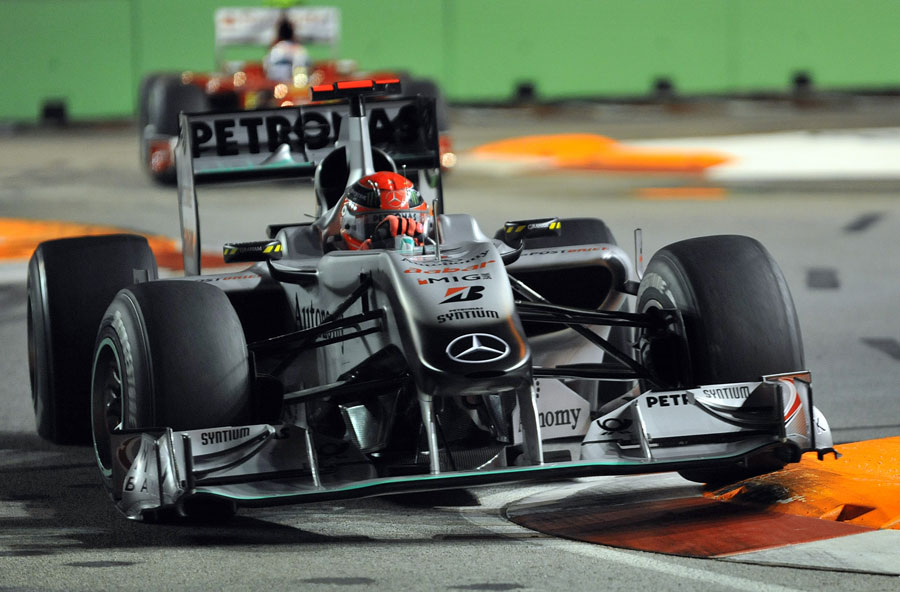 Michael Schumacher leads Fernando Alonso through the turn 10 chicane