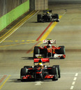 Lewis Hamilton stays ahead of Fernando Alonso