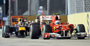 Fernando Alonso leads Sebastian Vettel away at the start