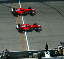 Rubens Barrichello beats Michael Schumacher across the line by 0.011 seconds in a staged finish