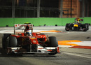Fernando Alonso leads Sebastian Vettel through the turn 10 chicane