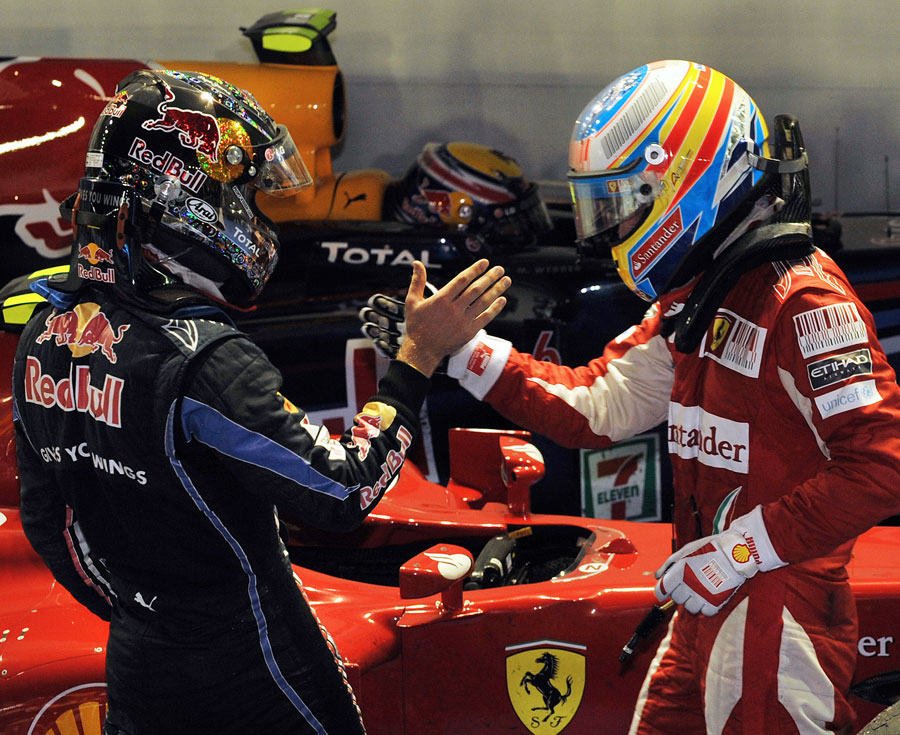 Sebastian Vettel and Fernando Alonso shake hands after the race
