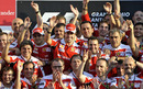 Fernando Alonso celebrates with the Ferrari team