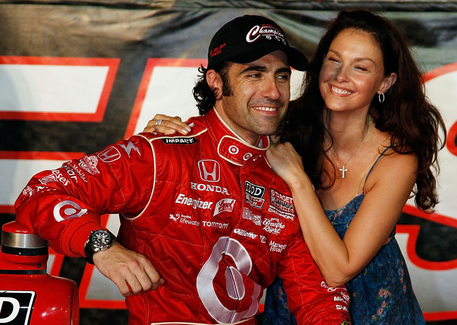 Dario Franchitti celebrates winning the championship with wife Ashley Judd 