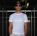 Mark Webber lurks in the Red Bull motorhome