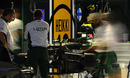 Lotus mechanics work on Heikki Kovalainen's car