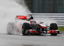 Jenson Button on track in terrible conditions