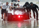 Mercedes push Nico Rosberg back to the garage