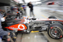 Jenson Button leaves the pits in the wet