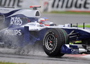 Rubens Barrichello during a wet FP3
