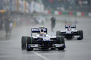 The Williams duo of Nico Hulkenberg and Rubens Barrichello get in some track time on a wet Saturday