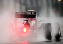 Mark Webber disperses litres of water down the straight
