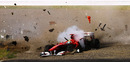 Felipe Massa's Ferrari falls apart after his collision with Tonio Liuzzi