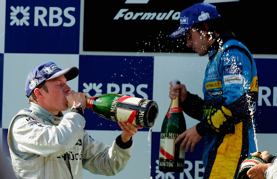 Kimi Raikkonen celebrates on the podium after winning the 2005 Turkish Grand Prix
