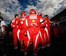 The Ferrari pit crew on the grid