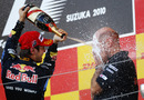 Sebastian Vettel gives Adrian Newey a champagne soaking